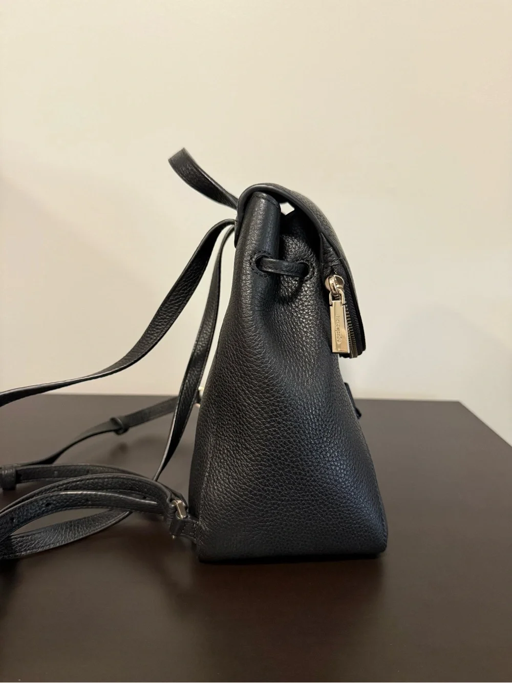 Kate Spade New York Black Pebbled Leather Flap Backpack